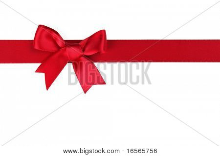 Červená stuha s lukem na bílém pozadí