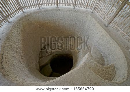 spiral stairs leading to an underground tomb in Tierradentro Colombia