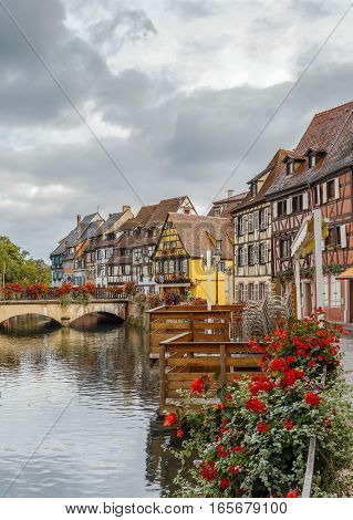 Embankment of Lauch River with historical houses in Colmar Alsace France