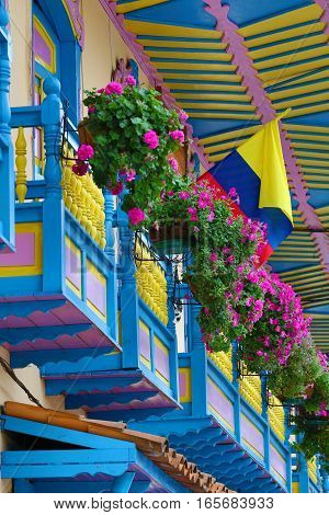 blooming flowers decorating colonial style balconies in Colombia