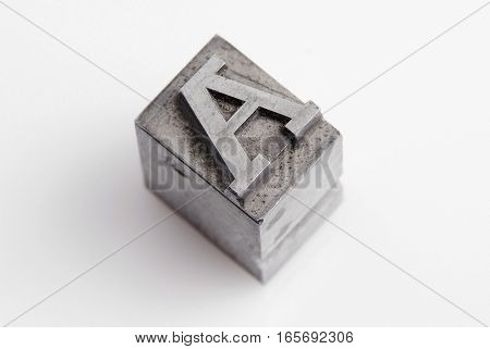 Lead metal capital letter A from the printing press