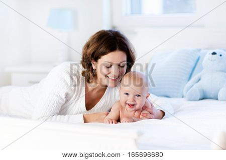 Baby And Mother At Home. Mom And Child.