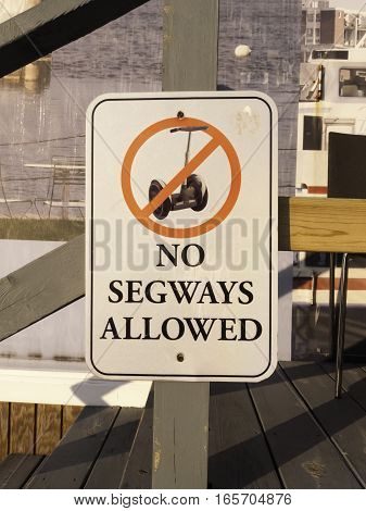 South Boston Massachusetts USA - May 26 2016: Sign along Boston Harborwalk warning that no Segways are allowed