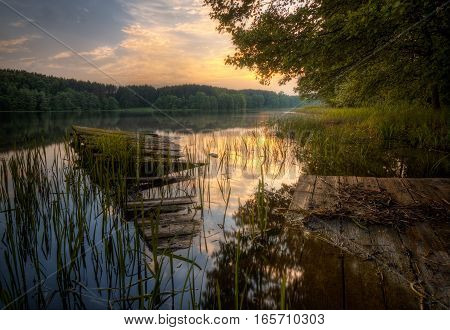Old pier on Bolesty Lake on Rospuda kayak trail Poland