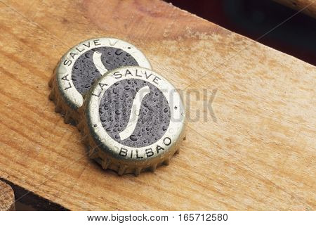 Two Bottle Caps Of La Salve Original Beer.