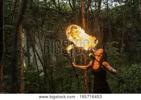 fire show Fire Breather Large Plume Of Flame the girl