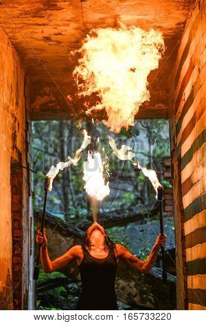 fire show Fire Breather Large Plume Of Flame the girl