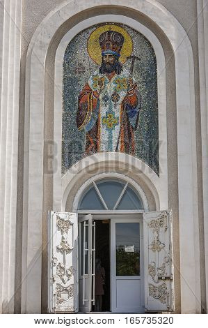 Church Dmitry Rostovsky - Orthodox church in Rostov -on-Don Russia . The mosaic mural depicting the saint above the main entrance .