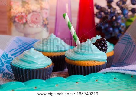 Homemade cupcakes with mint cream on holiday