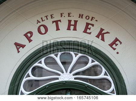 SALZBURG, AUSTRIA - APRIL 29, 2016: Facade of the oldest pharmacy located on Alter Markt square historic centre of the city. Salzburg Austria