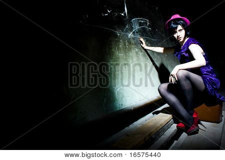 portrait of a beautiful brunette girl with hat