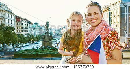 Smiling Mother And Child Tourists With Czech Flag