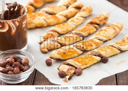 Homemade Cakes - Puff Pastry With Chocolate Paste. Twisted Cakes With Chocolate