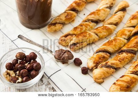 Homemade Cakes - Puff Pastry With Chocolate Paste. Twisted Cakes With Chocolate