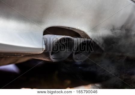 Close-up Of Two Exhaust Pipe On The Car