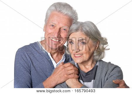 Portrait of smiling senior couple isolated on white background