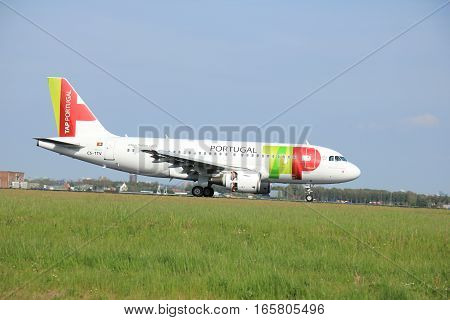 May11th 2015 Amsterdam the Netherlands: CS-TTV TAP - Air Portugal Airbus A319-100 on the Polderbaan runway of Amsterdam Schiphol Airport. TAP Portugal founded in 1945 as Transportes Aéreos Portugueses known as TAP is the flag carrier airline of Portugal.