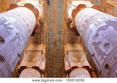 DENDERA, EGYPT: The huge pillars and beautiful ceiling inside Dendera temple dedicated to Hathor goddess