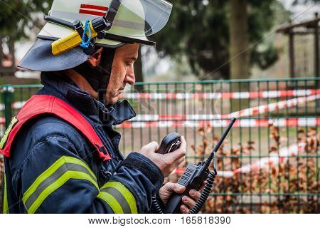 HDR - Firefighter in action with a walkie talkie