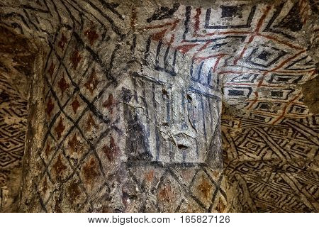 ancient paintings in underground pre-columbian grave in Tierradentro Colombia