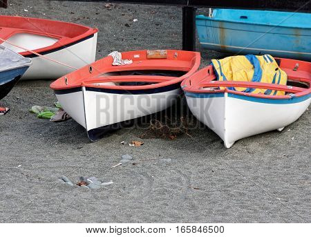 detail of same boats in a beach in arenzano