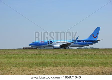 Amsterdam The Netherlands - June 12 2015: PH-TFC Arke Boeing 737-800 takes off at Amsterdam Airport Schiphol Polderbaan runway. TUI Airlines Netherlands trading as Arke is a Dutch charter airline headquartered in Schiphol-Rijk