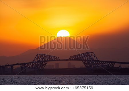 Diamond Fuji View of the setting sun meeting the summit of Mt. Fuji