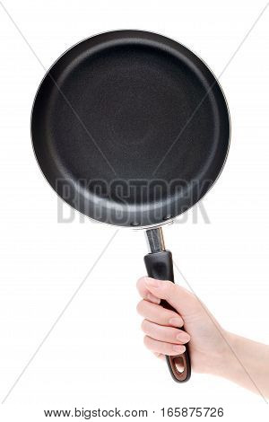 Hand holding frying pan isolated on a white background