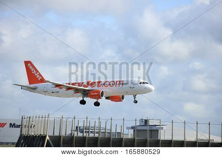 Schiphol Amsterdam The Netherlands april 11 2015: G-EZWB easyJet Airbus A320-214 approaching runway 09/27 Buitenveldert