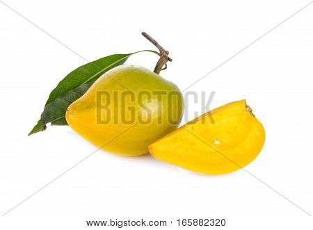 ripe Tiesa or egg fruit with stem and leaves on white background