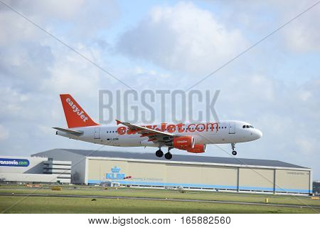 Schiphol Amsterdam The Netherlands april 11 2015: G-EZWB easyJet Airbus A320-214 approaching runway 09/27 Buitenveldert