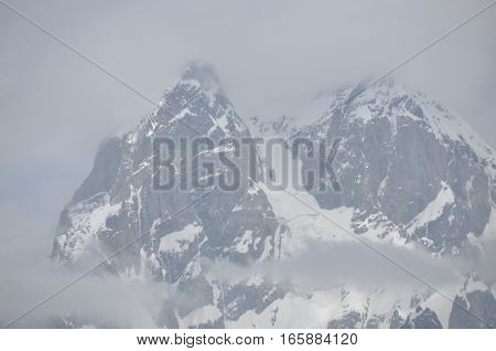 Ushba peak in the Caucasus Mountains. Snowy playing.
