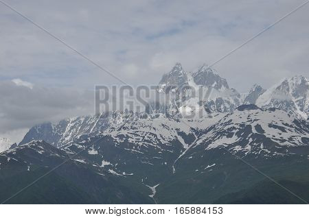 Ushba peak in the Caucasus Mountains. Snowy playing.