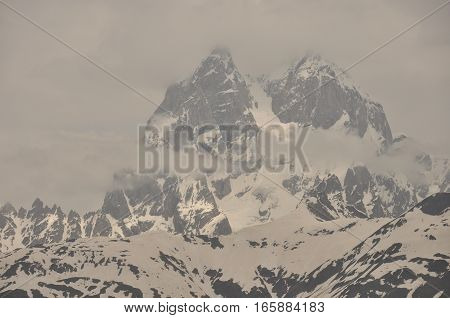 Ushba peak in the Caucasus Mountains. Snowy playing.