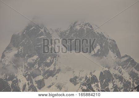 Ushba peak in the Caucasus Mountains. Snowy playing.
