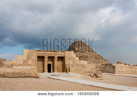 The Great Pyramid at Giza Plateau on the background of clouds