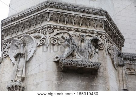 Jesus, the woman and the angels. Detail architecture Basilica of Notre-Dame de Fourviere is located on the hill of Fourviere. Lyon. France.
