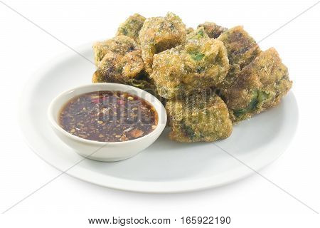 Plate of Fried Chinese Pancake or Fried Steamed Dumpling Made of Garlic Chives Rice Flour and Tapioca Flour Served with Spicy Soy Sauce. Traditional Food of China.