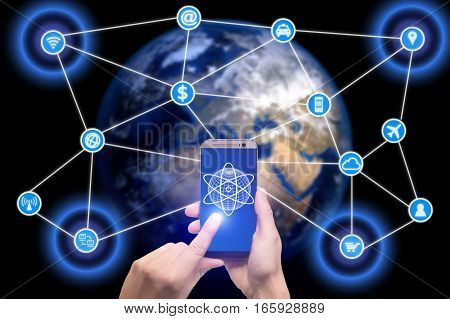 Network of connected mobile devices such as smart phone tablet thermostat or smart home. Internet of things and mobile computing concept.