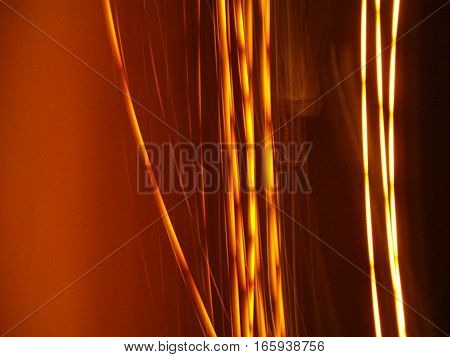 Picture of several lines of light on a brown background
