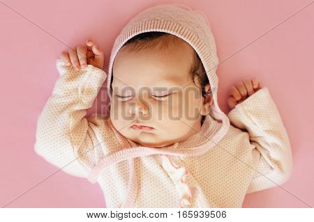 Newborn sweet cute baby girl face sleep