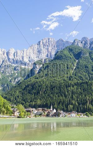 ALLEGHE,ITALY-AUGUST 2,22016:view of the Alleghe village and his under the dolomitic mount of Civetta during a sunny day.