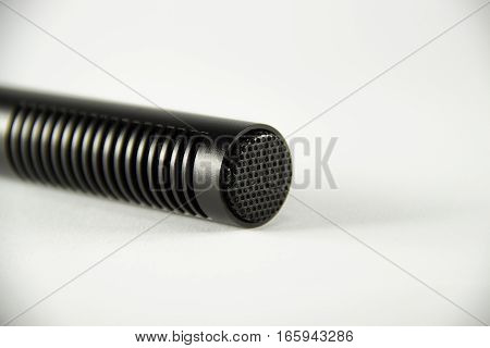 production, mike, television, tv, audio, microphone, professional, directional, mic, boom, media, object, news, isolated, industry, movie, pole, up, technology, fish, sound, recording, shotgun, white, equipment, background, film, rifle, cable, gun, close,