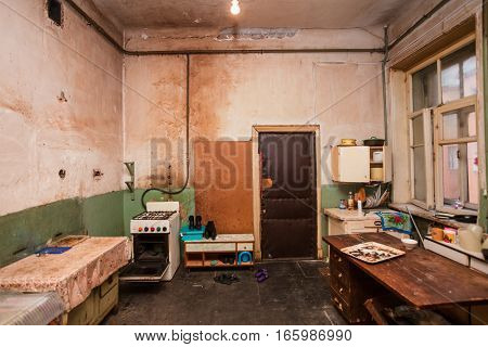 Dirty kitchen is in the temporary apartment for living (existence) refugees