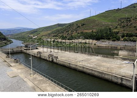 View Of The Lock Of The Regua Dam, Also Called Bagauste Dam, In The Douro River, Portugal. The Lock 