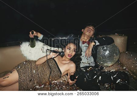 Gourgous Young Woman Drinking Wone And Singing In Karaoke While Her Boyfriend Is Blacked Out