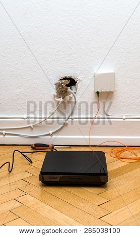 Fiber Optic Installation On Home Wall With Obsolete Catv And New Ftth Fiber Outlets And Internet Rec