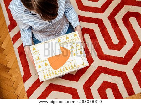 Paris, France - Jan 5, 2018: Overhead View From Above Of Curious Fashionable Woman Opening The Cardb