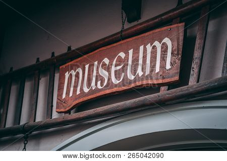 Old Museum Sign Outside A Small Village Museum On The Open Day In The Indirect Light