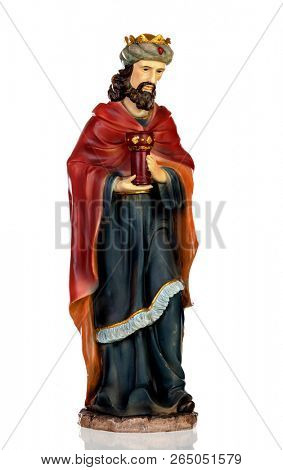 Gaspar, one of the three wise men. Ceramic figure isolated on white background